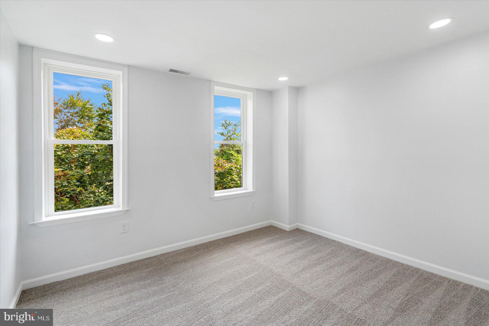 1432 Carroll Street Baltimore, MD 21230 - Photo 22 of 29 an empty room with windows
