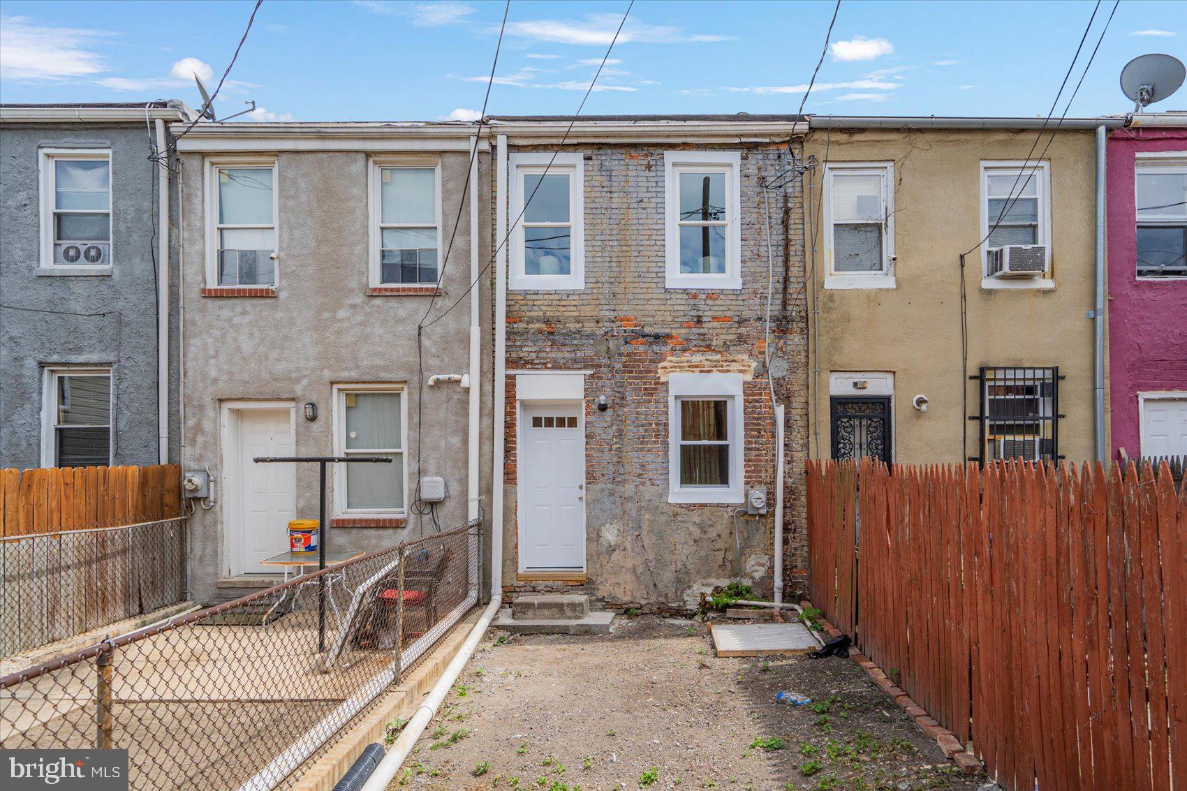 1432 Carroll Street Baltimore, MD 21230 - Photo 28 of 29 a view of a house with a backyard