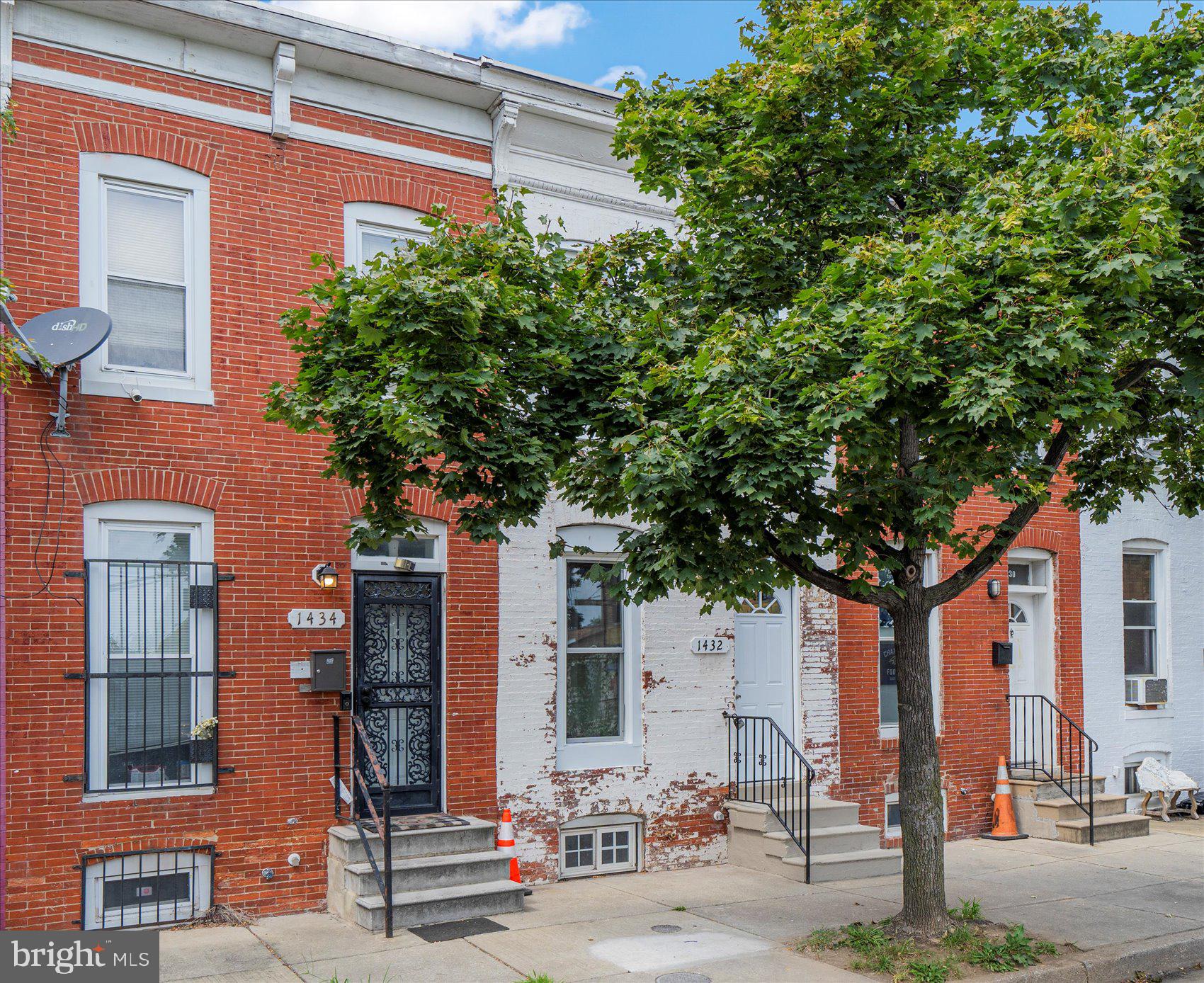 1432 Carroll Street Baltimore, MD 21230 - Photo 3 of 29 a front view of a building with street view