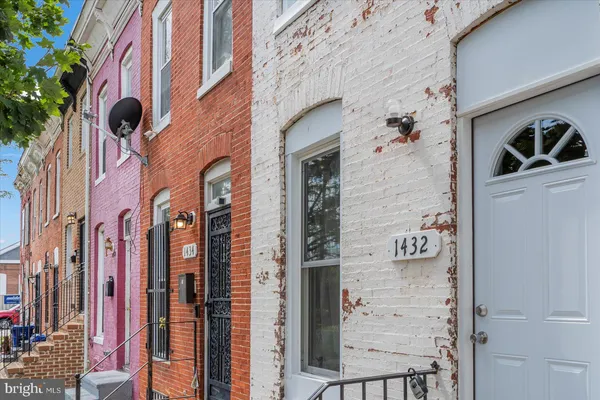a view of an entryway with brick walls