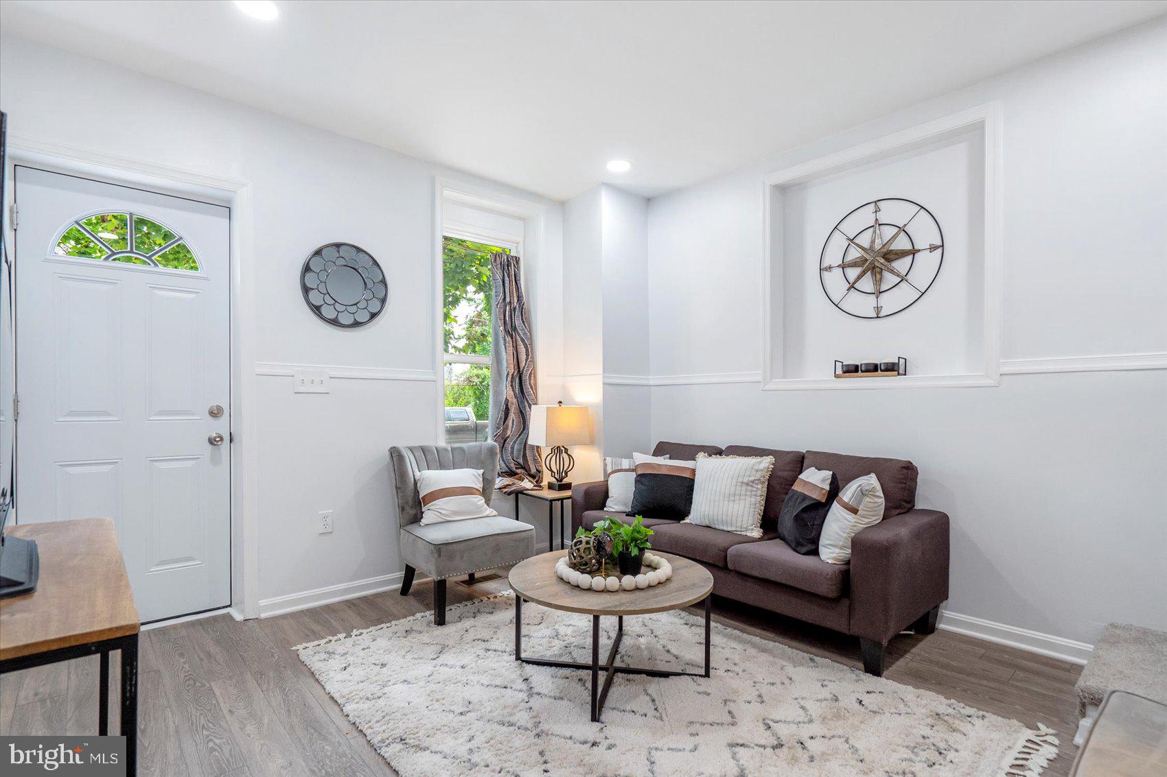 1432 Carroll Street Baltimore, MD 21230 - Photo 5 of 29 a living room with furniture and a window