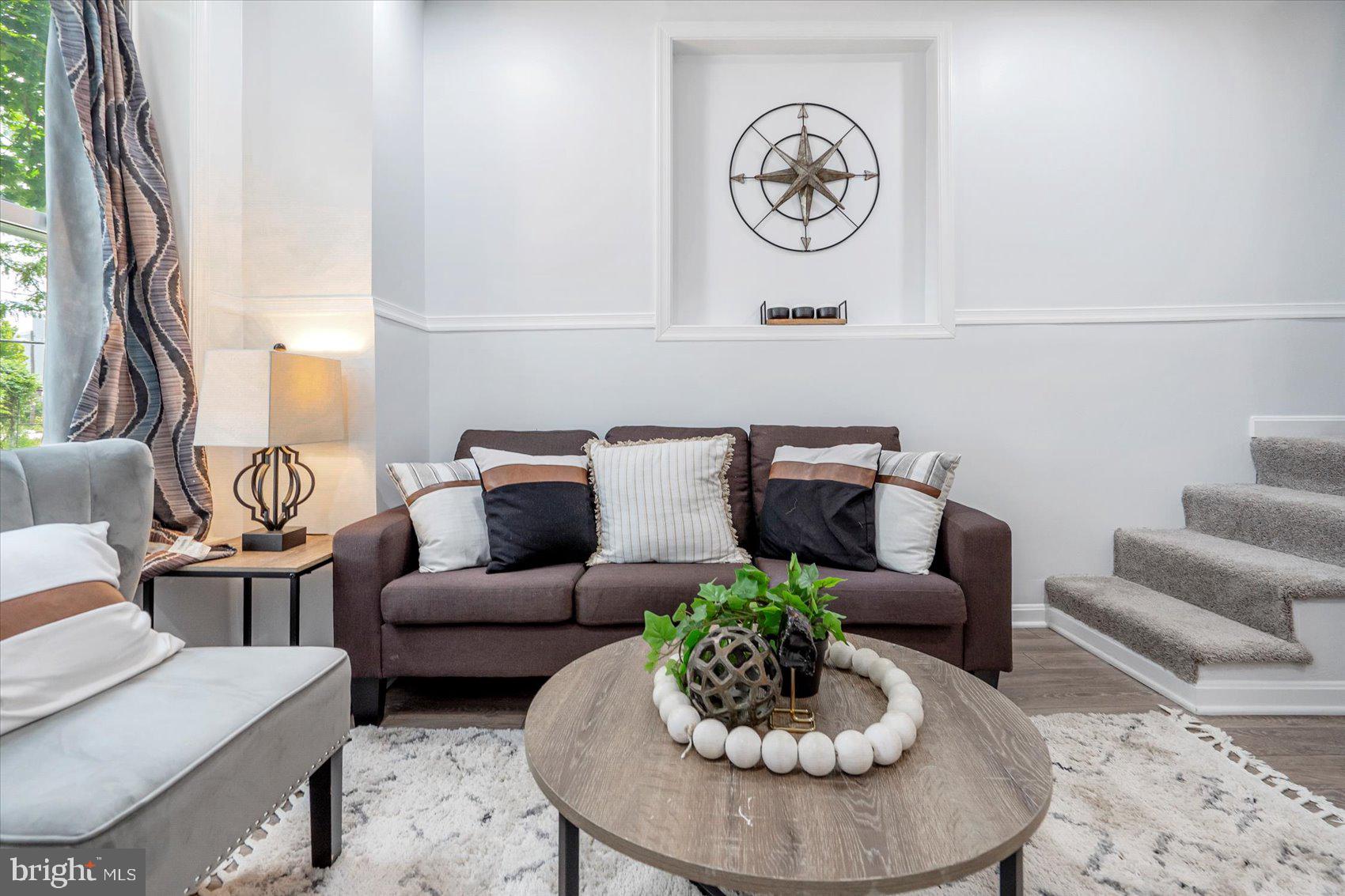 1432 Carroll Street Baltimore, MD 21230 - Photo 6 of 29 a living room with furniture and a table