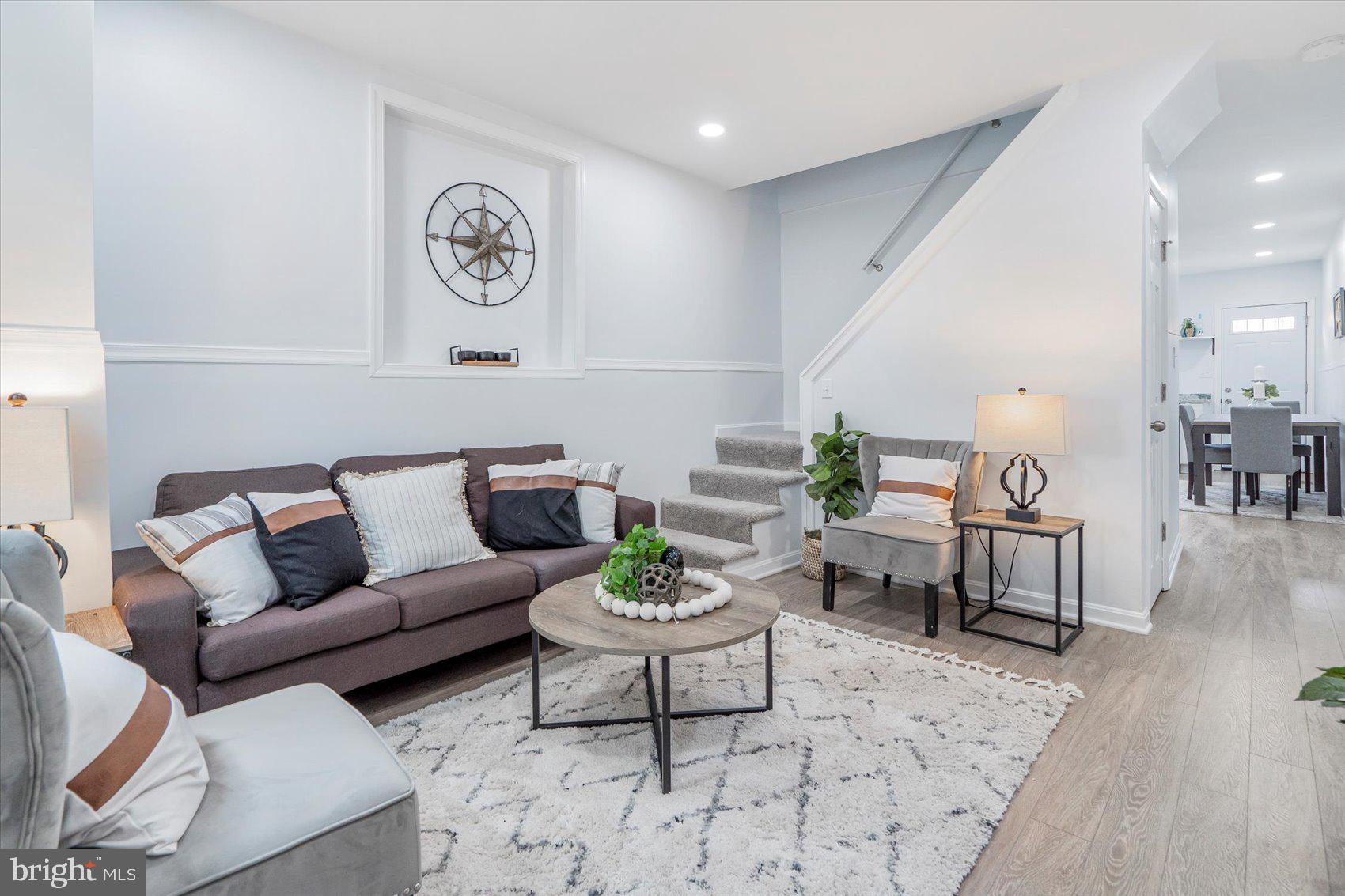 1432 Carroll Street Baltimore, MD 21230 - Photo 8 of 29 a living room with furniture a rug and a table
