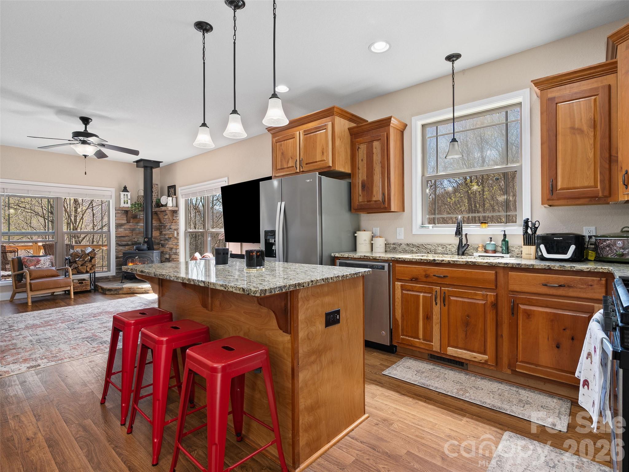 4823 Max Patch Road Clyde, NC 28721 - Photo 6 of 32 a large kitchen with lots of counter space and a sink