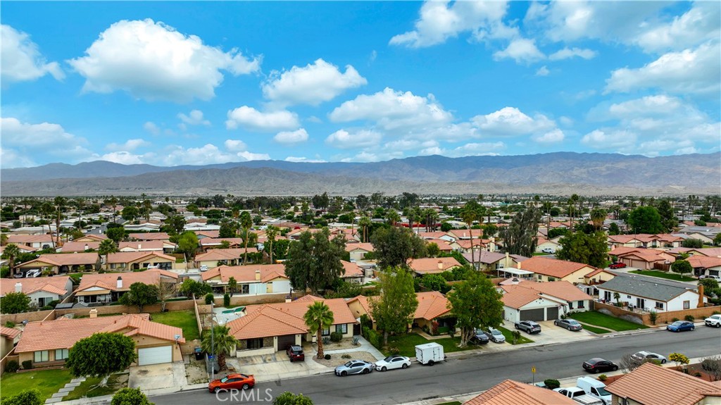 45546 Aladdin Street, Unit B101 Indio, CA 92201 - Photo 15 of 18 an aerial view of a city