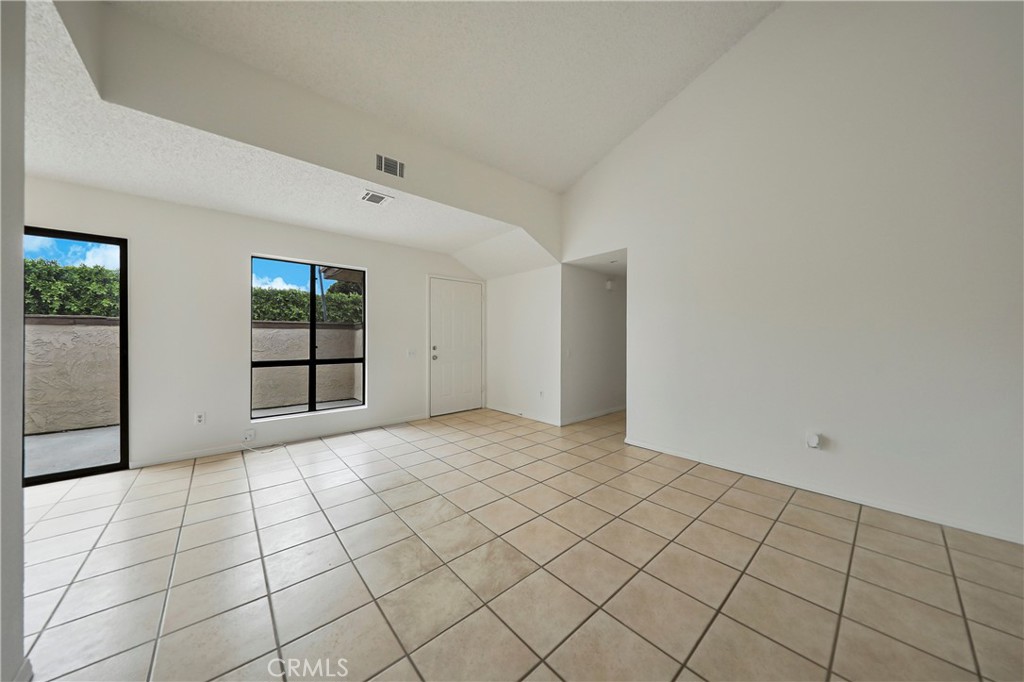 45546 Aladdin Street, Unit B101 Indio, CA 92201 - Photo 4 of 18 a view of an empty room and window