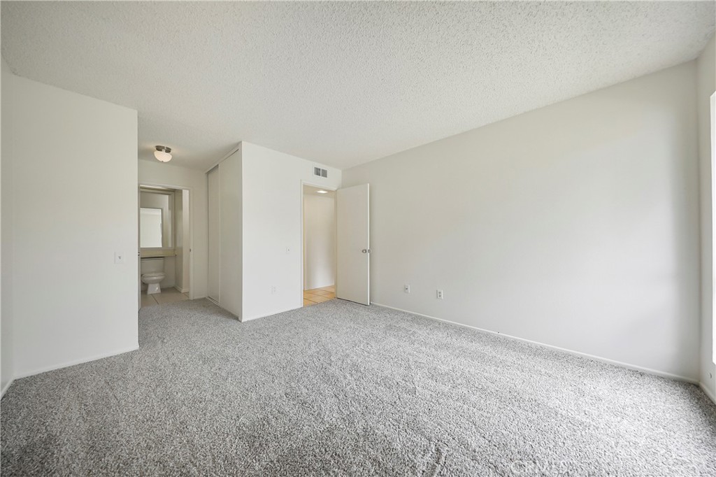 45546 Aladdin Street, Unit B101 Indio, CA 92201 - Photo 10 of 18 a view of an empty room and closet