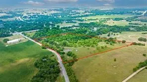a view of a yard with an outdoor space