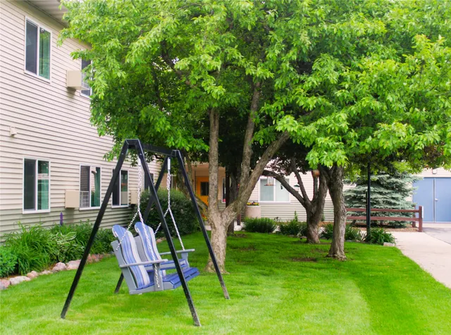 a view of a backyard with a slide