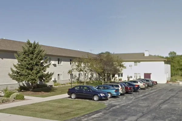 a cars parked in front of a house