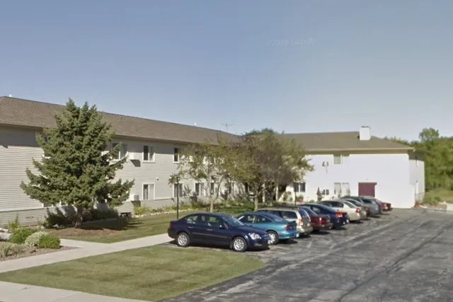 a cars parked in front of a house