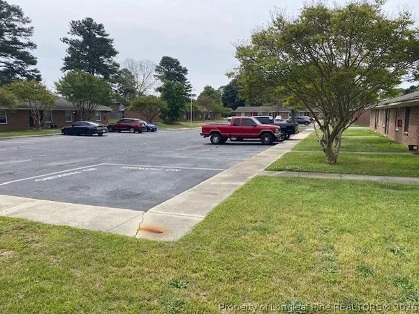 a view of a car parked in the middle of a road