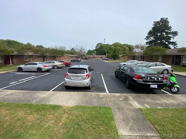 a car parked in the back of a building