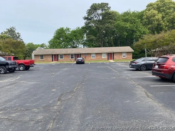 a view of street with parked cars