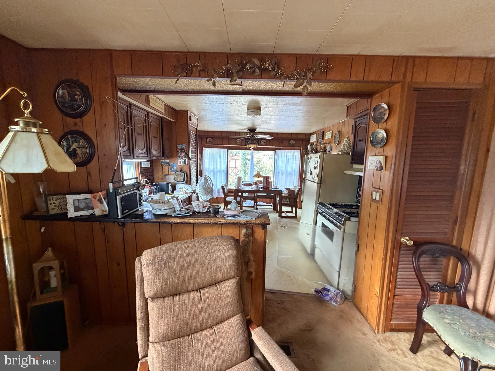 537 Dandelion Road Millville, NJ 08332 - Photo 5 of 33 a dining hall with stainless steel appliances granite countertop a stove and a refrigerator