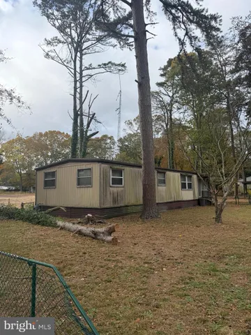 a view of a backyard of a house