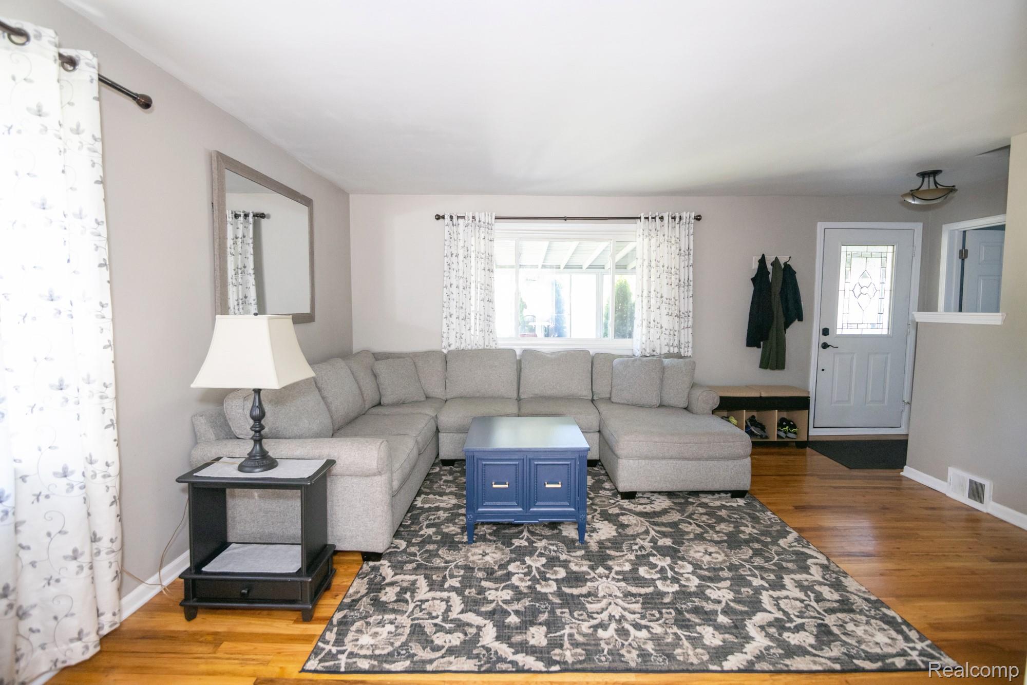 3757 Cone Avenue Rochester, MI 48309 - Photo 6 of 45 Living area featuring wood-finish flooring and neutral wall tones
