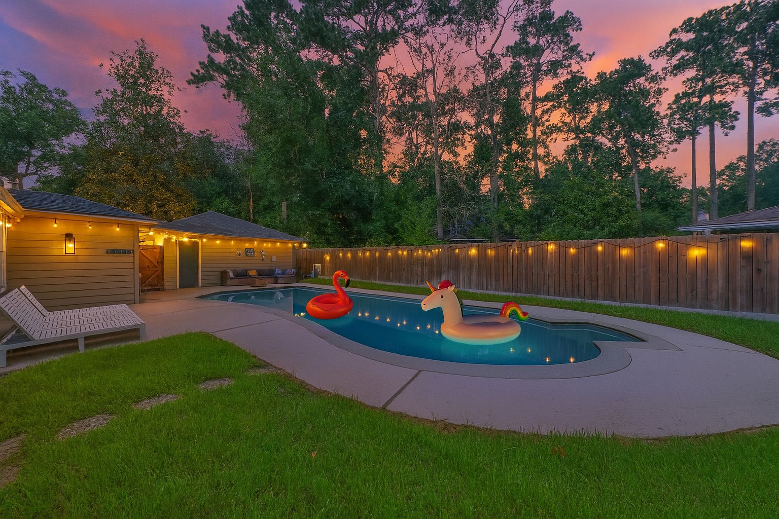 563 Landfall Lane Conroe, TX 77302 - Photo 1 of 25 a view of a backyard with large tree