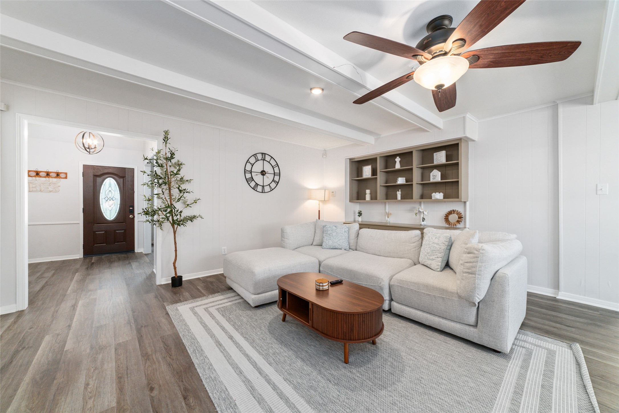 563 Landfall Lane Conroe, TX 77302 - Photo 14 of 25 a living room with furniture and a wooden floor