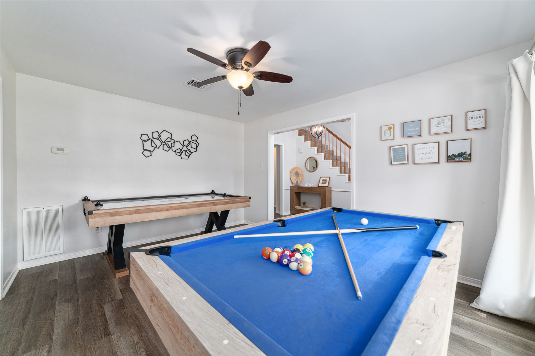 563 Landfall Lane Conroe, TX 77302 - Photo 8 of 25 a room with pool table and a wooden floor