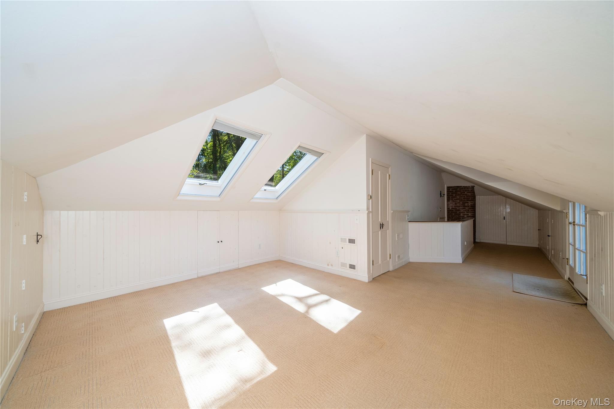 105 Douglas Road Chappaqua, NY 10514 - Photo 14 of 18 an empty room with windows