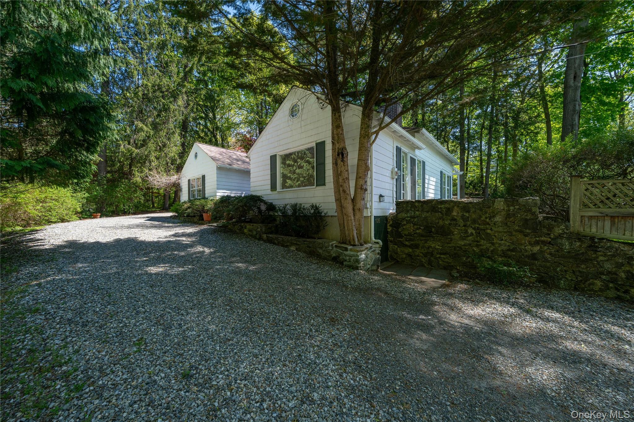105 Douglas Road Chappaqua, NY 10514 - Photo 2 of 18 a house view with a outdoor space