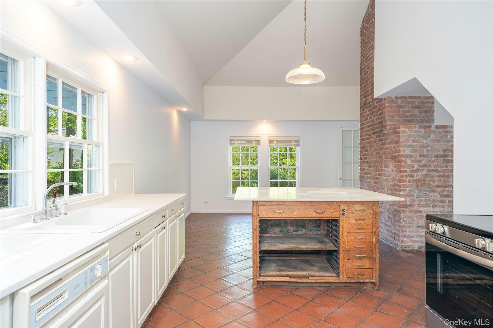 105 Douglas Road Chappaqua, NY 10514 - Photo 8 of 18 a bathroom with a sink and a large window