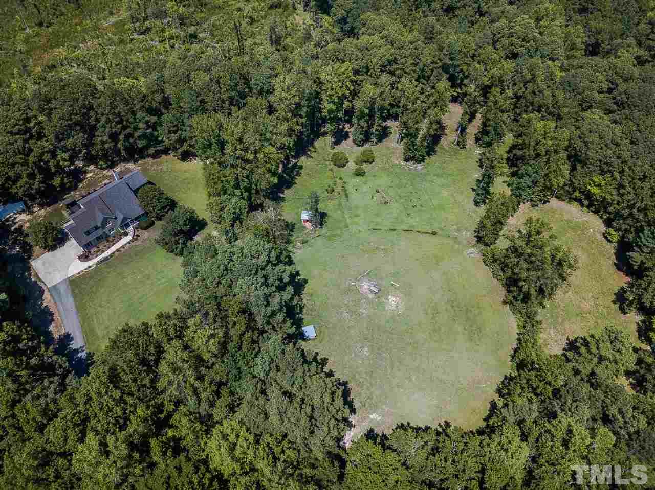 10.78 acres. Houses sits on the NW corner with the entire property line fenced in. Previous owner used the property for horses and had two pastures fences in.