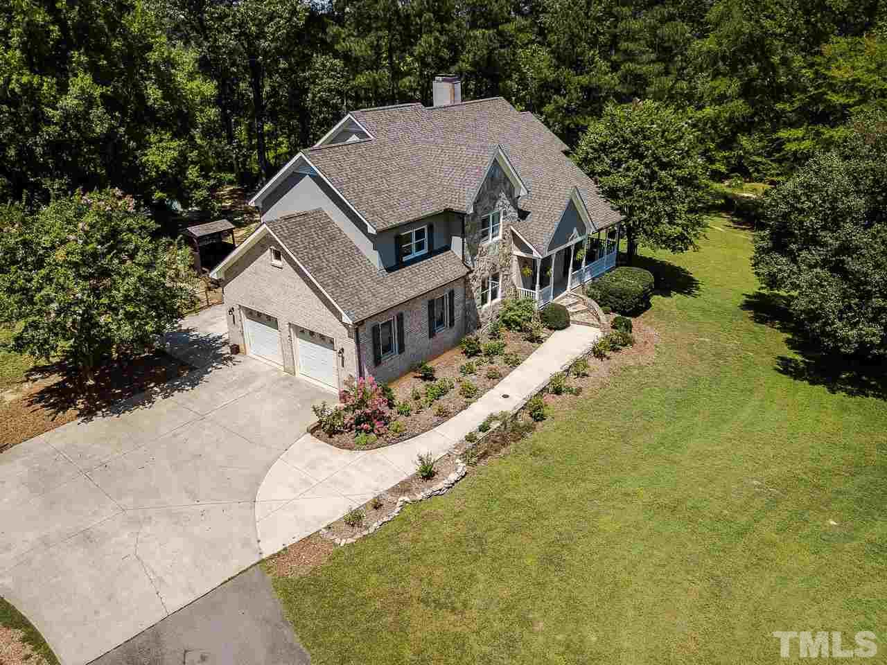 409 Luther Road Apex, NC 27523 - Photo 8 of 30 Plenty of parking with a 2 car garage and concrete pad