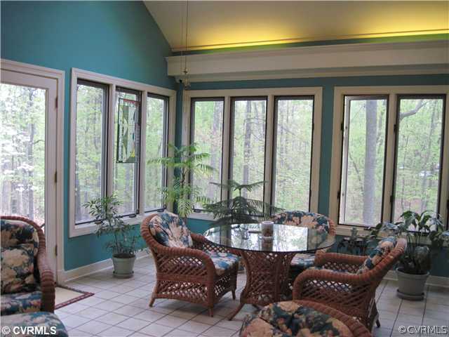 2911 Queenswood Road Midlothian, VA 23113 - Photo 10 of 12 a living room with furniture and a large window