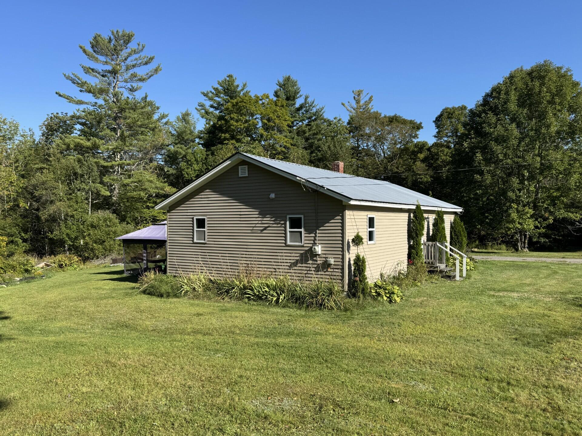 101 Ridge School Road Liberty, ME 04949 - Photo 5 of 25 Side of home