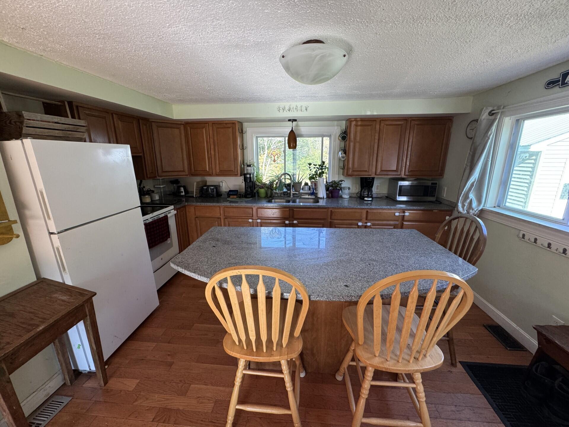 101 Ridge School Road Liberty, ME 04949 - Photo 10 of 25 Island to kitchen
