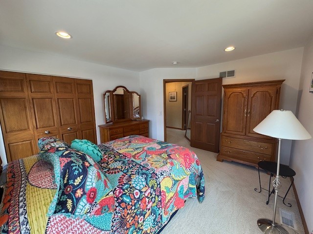 38332 Beachview Road Willoughby, OH 44094 - Photo 21 of 42 Bedroom with light colored carpet, recessed lighting, and a closet