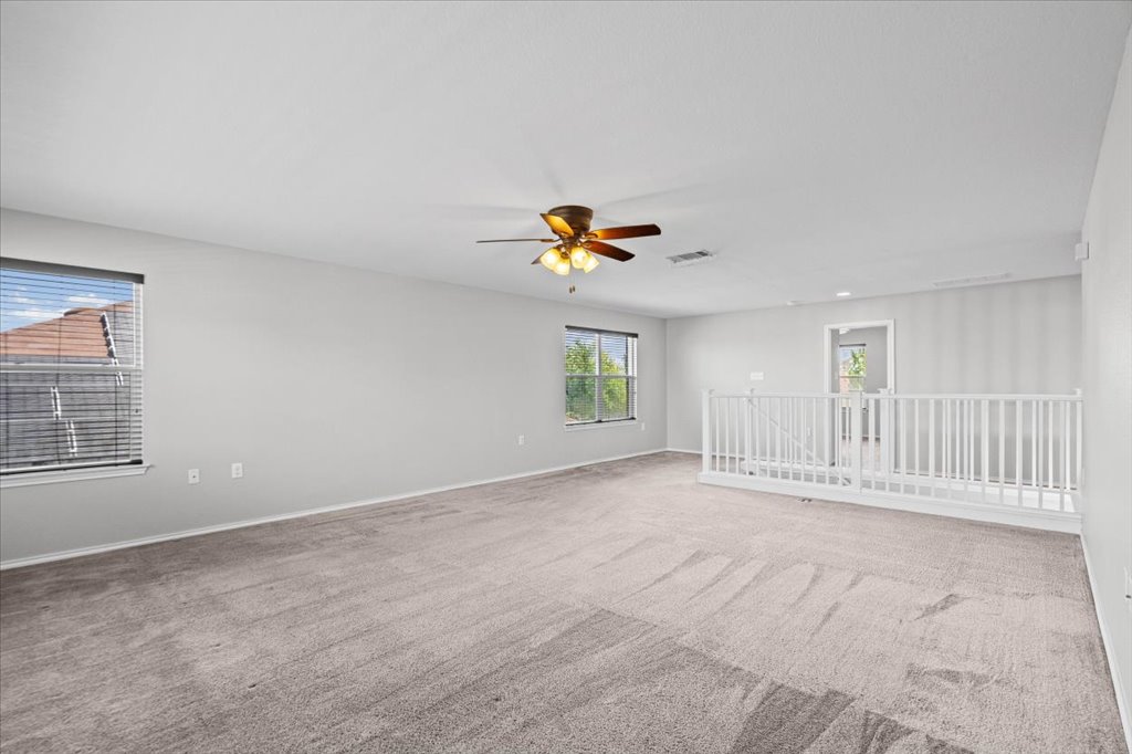 8804 Capitol View Drive Austin, TX 78747 - Photo 21 of 32 a view of an empty room with a window