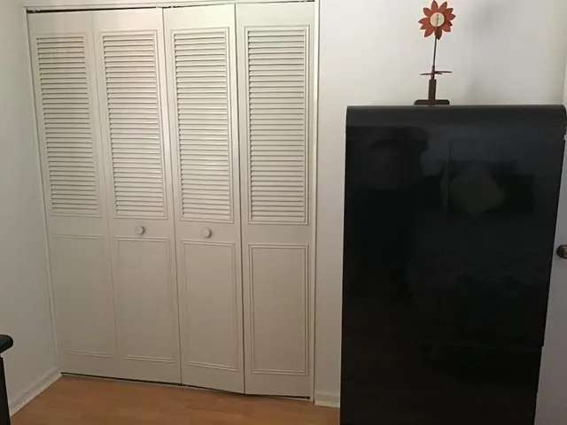 a view of a hallway with a window