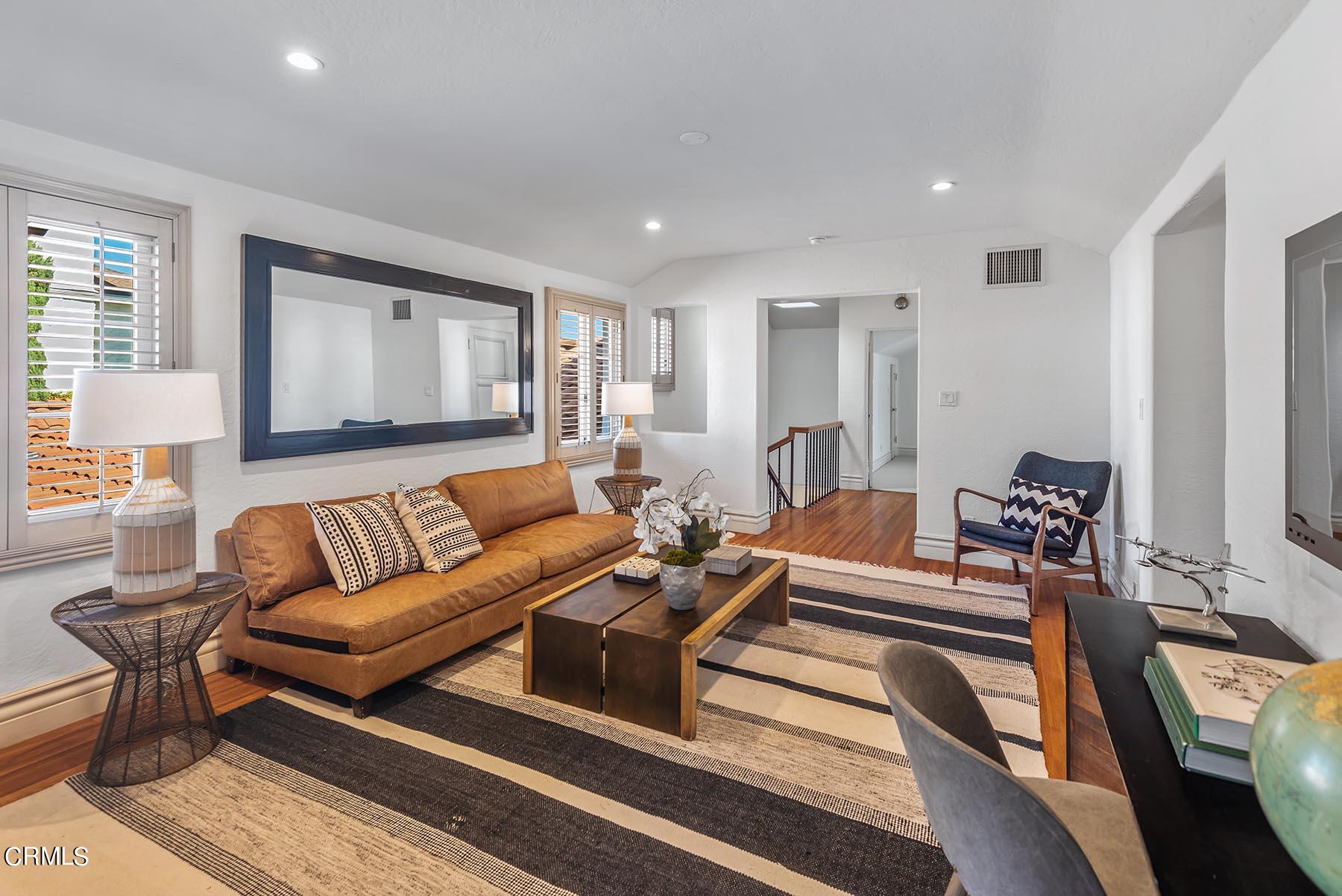 695 Holladay Road Pasadena, CA 91106 - Photo 28 of 44 a living room with furniture and wooden floor