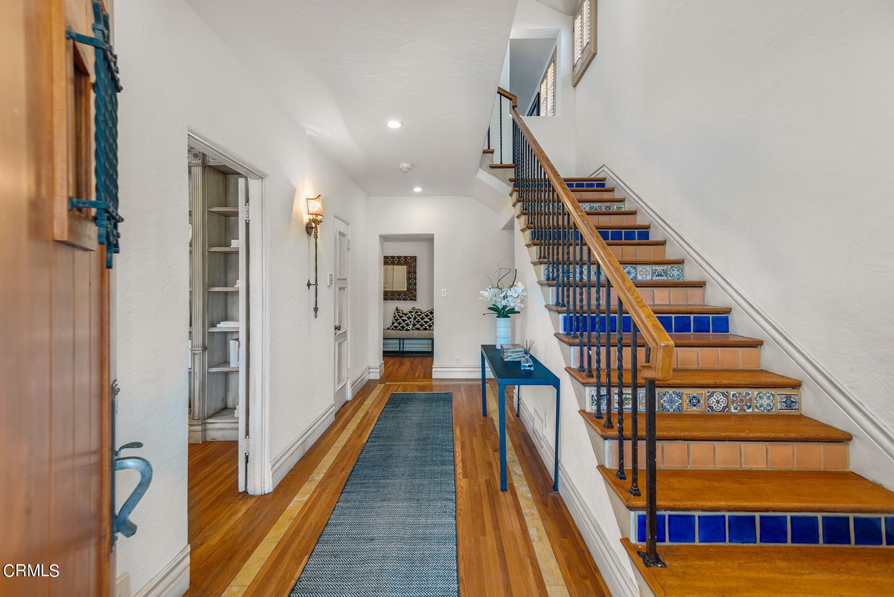 695 Holladay Road Pasadena, CA 91106 - Photo 5 of 44 a view of entryway and hall with wooden floor