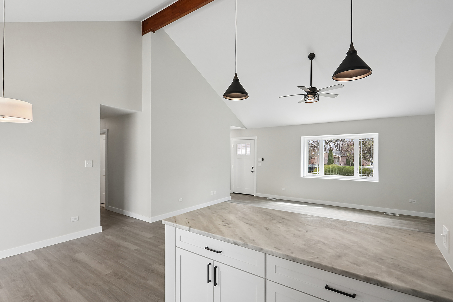 3520 William Street Steger, IL 60475 - Photo 5 of 21 a view of a room with a ceiling fan and wooden floor
