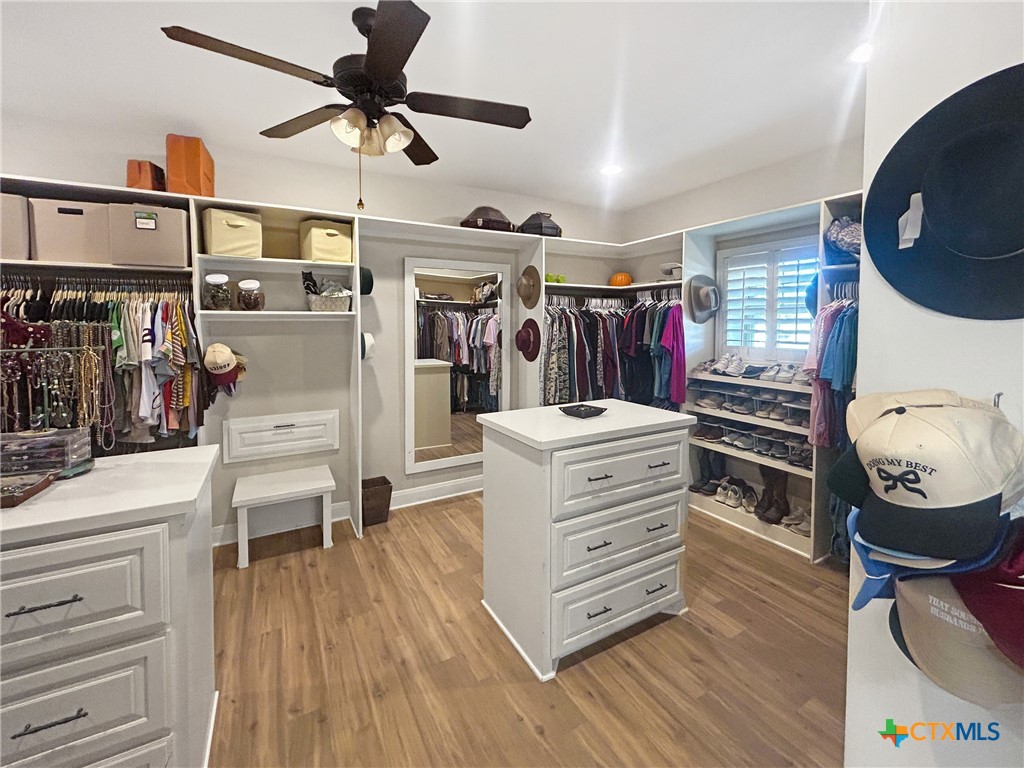 1747 Cr 139 Loop Cameron, TX 76520 - Photo 14 of 35 a view of walk in closet with clothes and shoes
