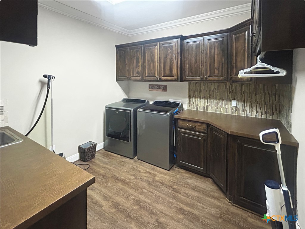 1747 Cr 139 Loop Cameron, TX 76520 - Photo 20 of 42 a kitchen with a stove and a refrigerator