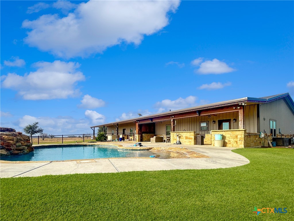 1747 Cr 139 Loop Cameron, TX 76520 - Photo 25 of 35 a front view of a house with garden