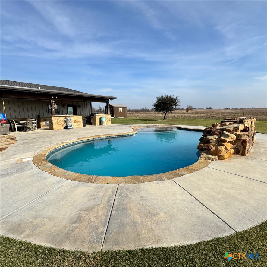 1747 Cr 139 Loop Cameron, TX 76520 - Photo 29 of 42 a view of a swimming pool with an ocean view