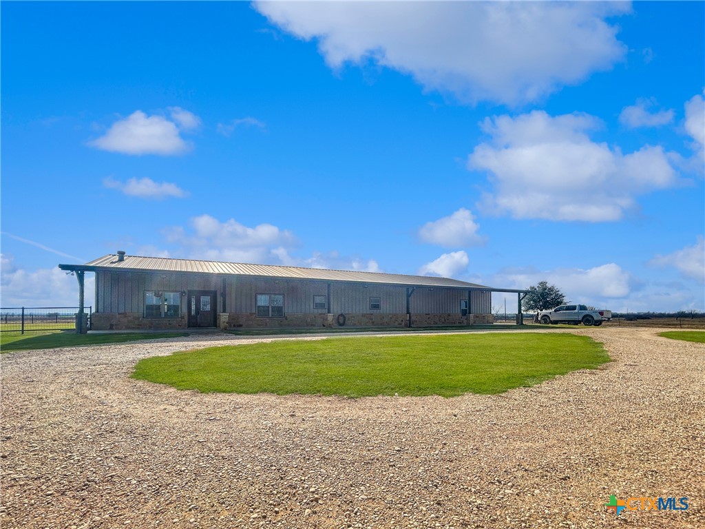 1747 Cr 139 Loop Cameron, TX 76520 - Photo 3 of 42 a view of a swimming pool with an outdoor space and seating area