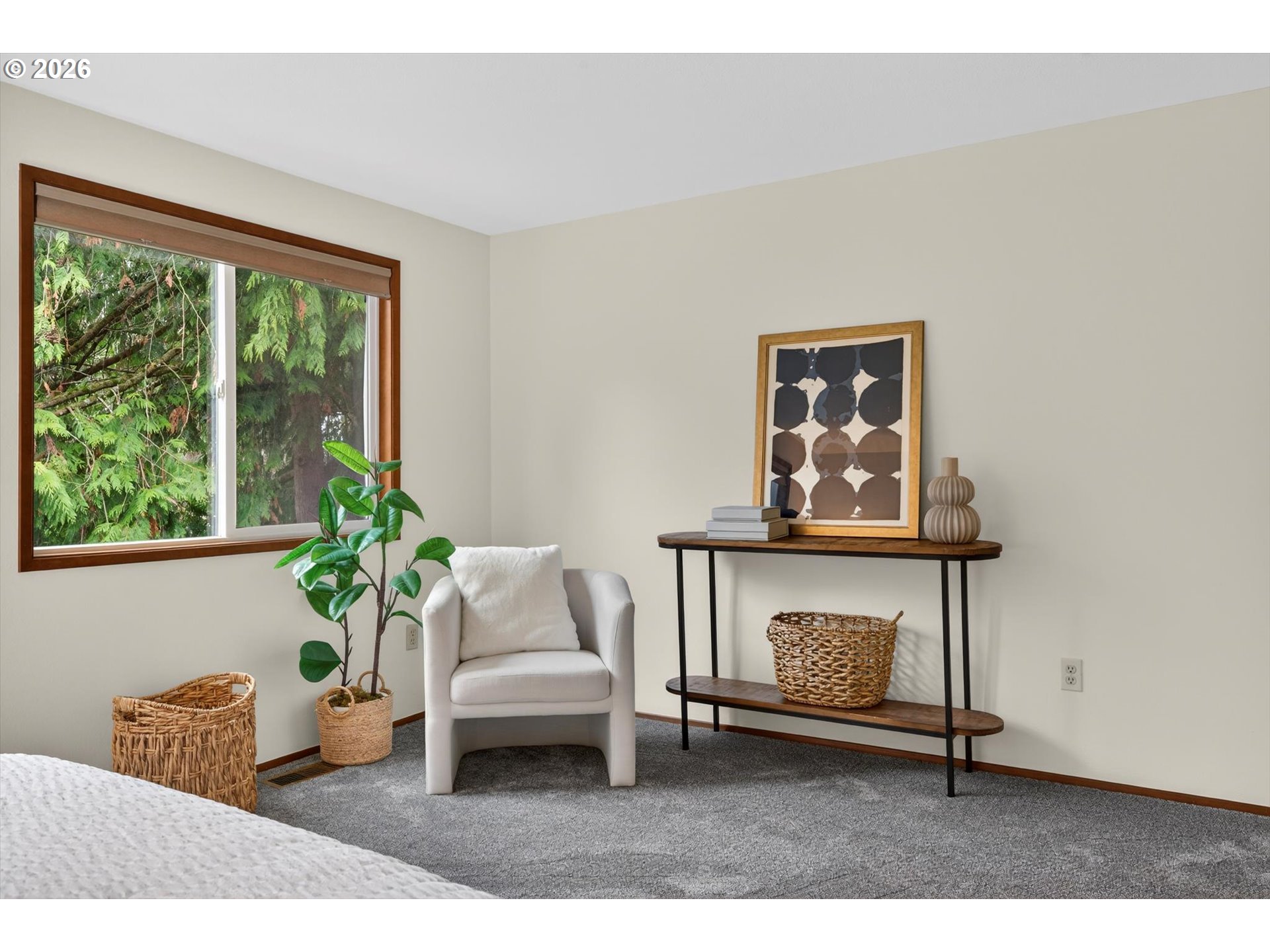 18145 Southwest Monte Verdi Boulevard Beaverton, OR 97007 - Photo 14 of 24 a living room with furniture a window and a potted plant