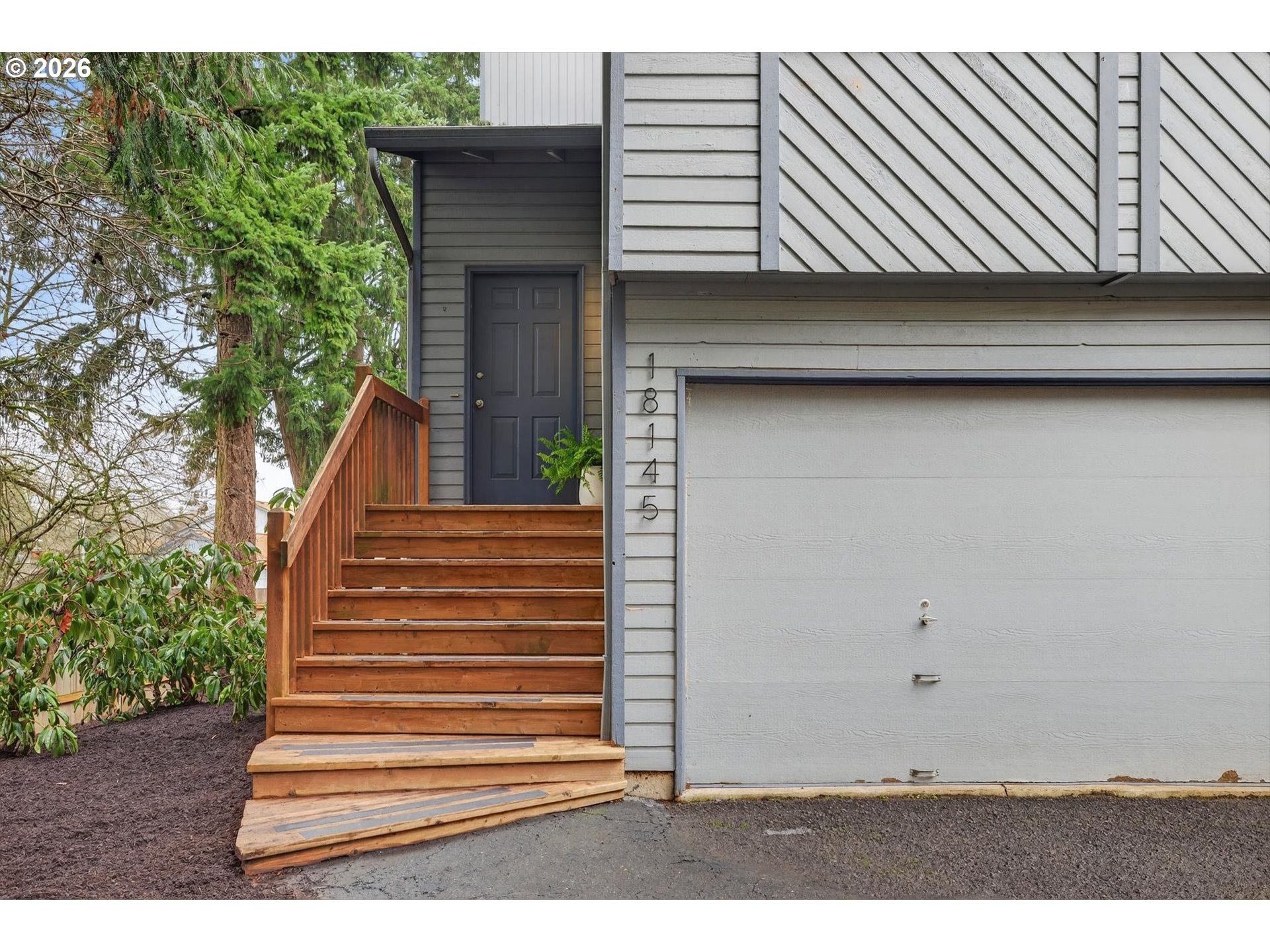 18145 Southwest Monte Verdi Boulevard Beaverton, OR 97007 - Photo 2 of 24 a view of entryway with wooden floor