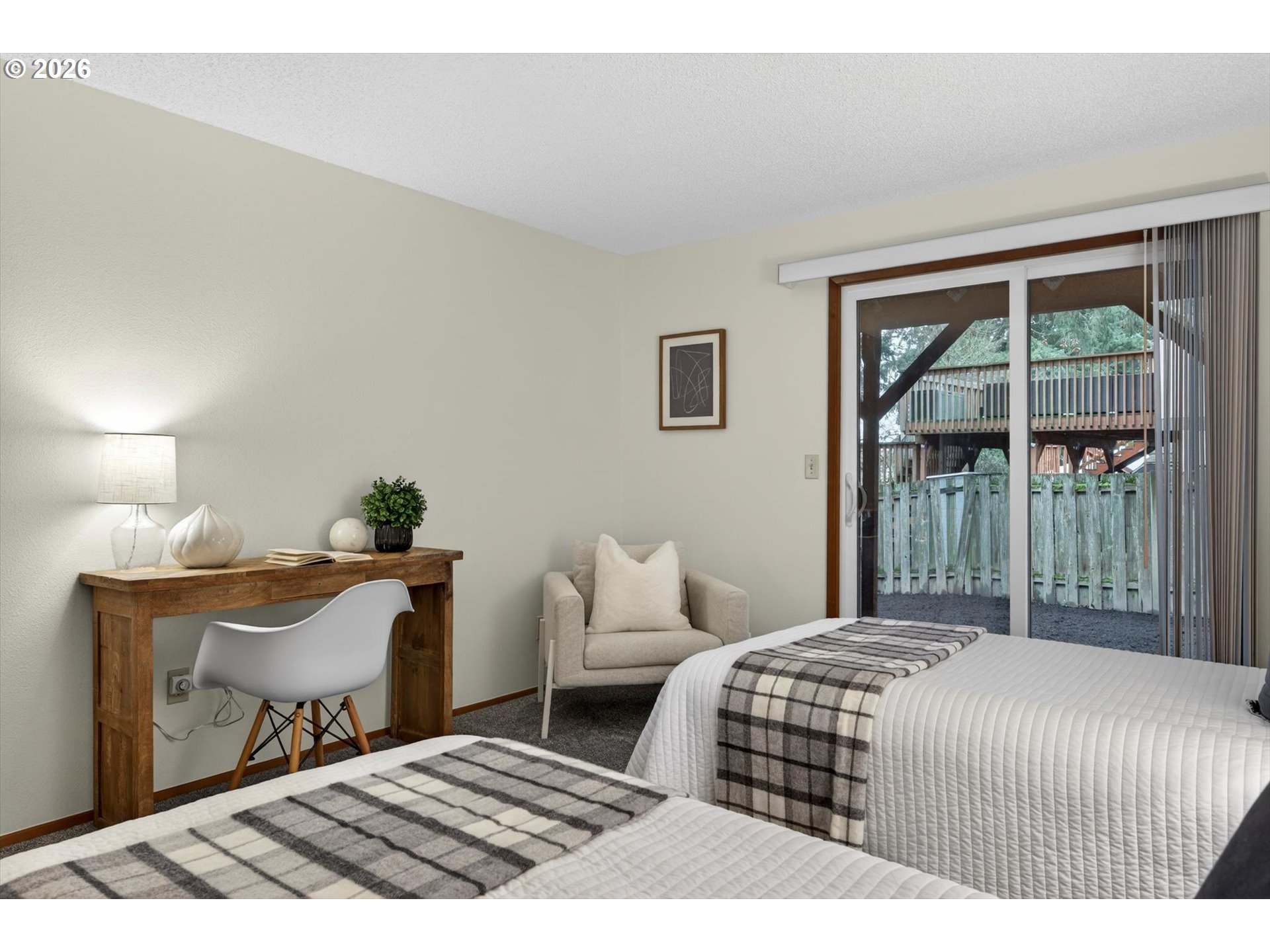 18145 Southwest Monte Verdi Boulevard Beaverton, OR 97007 - Photo 22 of 24 a bedroom with a bed and a window