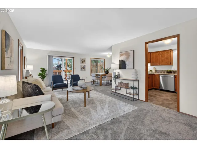 a living room with furniture and a couch