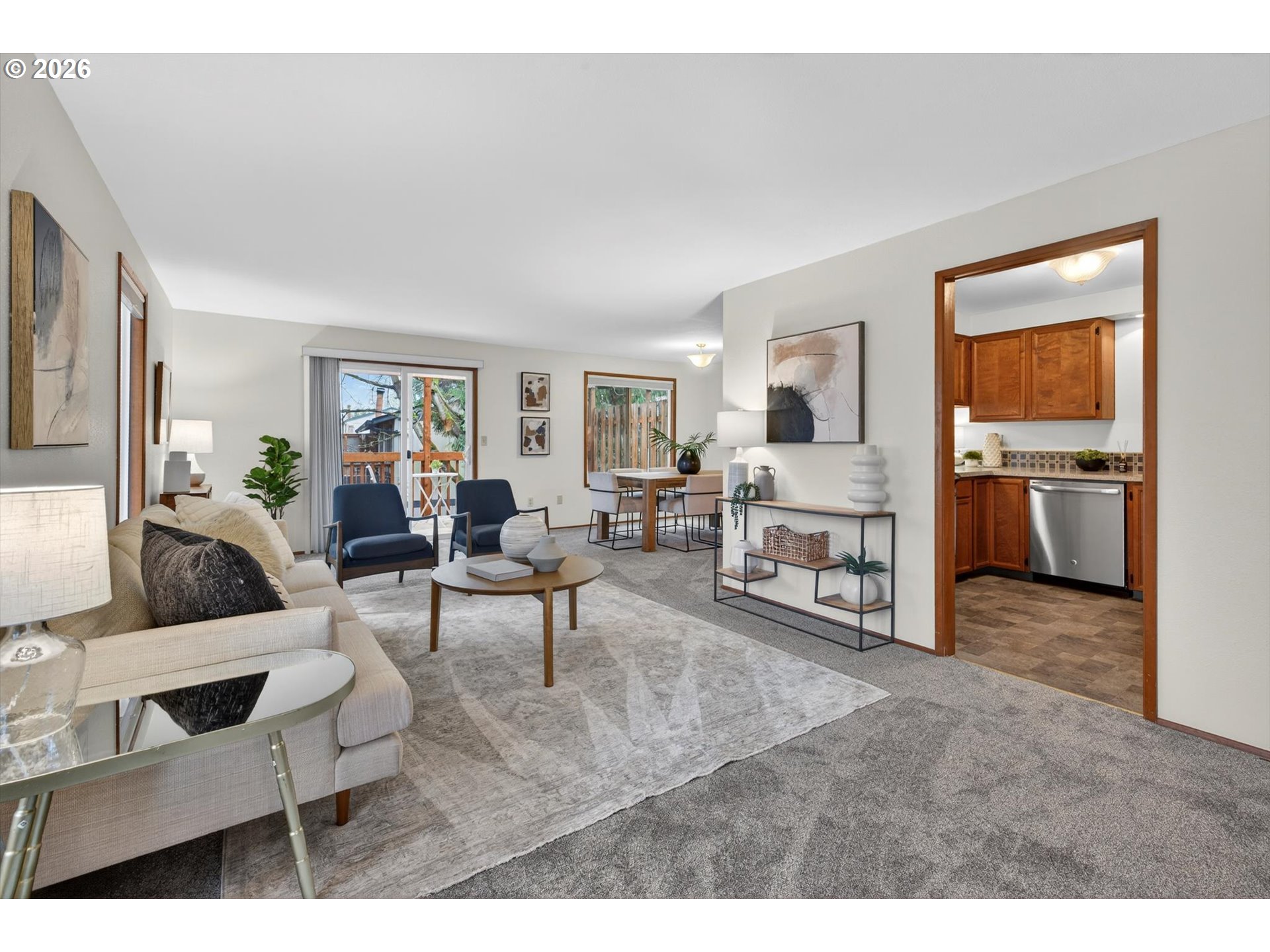 18145 Southwest Monte Verdi Boulevard Beaverton, OR 97007 - Photo 5 of 24 a living room with furniture and a couch