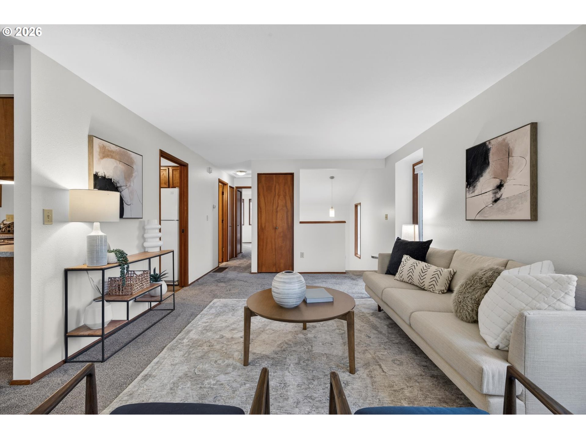 18145 Southwest Monte Verdi Boulevard Beaverton, OR 97007 - Photo 8 of 24 a living room with furniture and a wooden floor