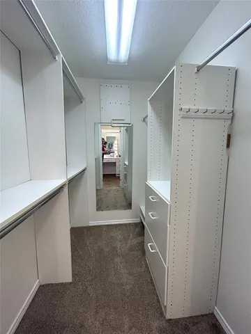 a view of a walk in closet